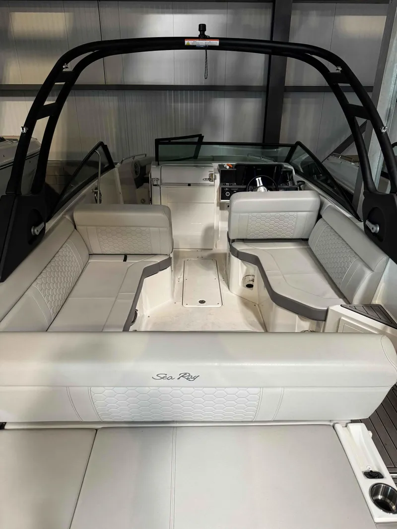 Slide: The Image of 2023 Sea Ray 250SDX boat interior with luxurious seating and modern design. - 6