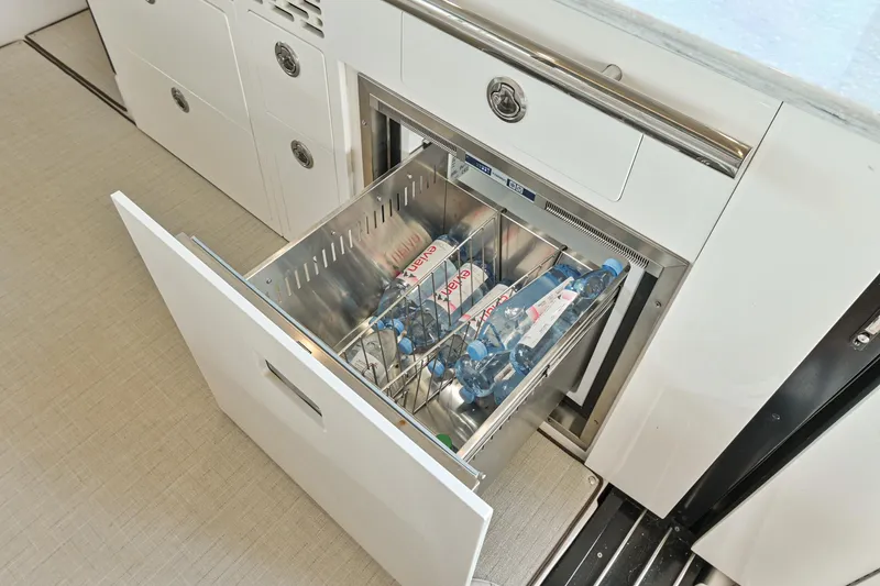 Slide: The Image of Open drawer refrigerator in 2021 Regal 36 Grande Coupe yacht kitchen. - 24