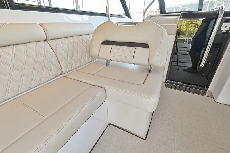 Slide: The Image of Luxurious interior seating of 2021 Regal 36 Grande Coupe yacht. - 29