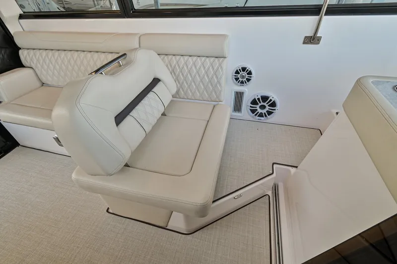 Slide: The Image of Luxurious interior seating of 2021 Regal 36 Grande Coupe yacht. - 39