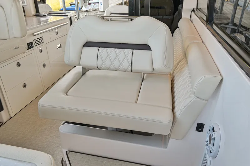 Slide: The Image of Luxurious seating on 2021 Regal 36 Grande Coupe yacht interior. - 40