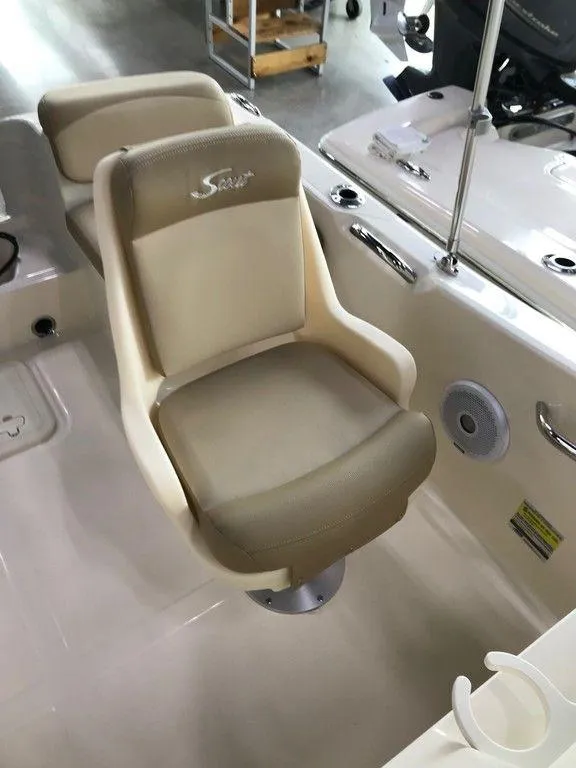 Slide: The Image of 2025 Scout 175 Sport Dorado boat seat, beige upholstery, sleek design. - 4
