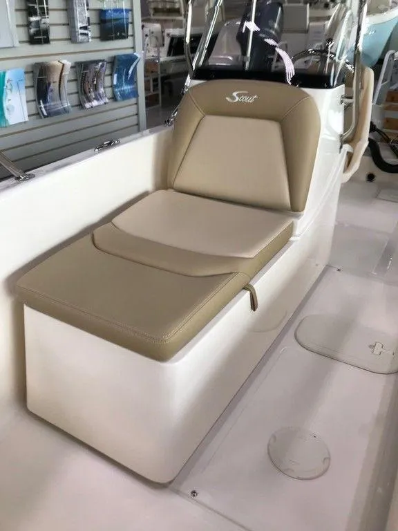 Slide: The Image of 2025 Scout 175 Sport Dorado boat interior with beige seating. - 6