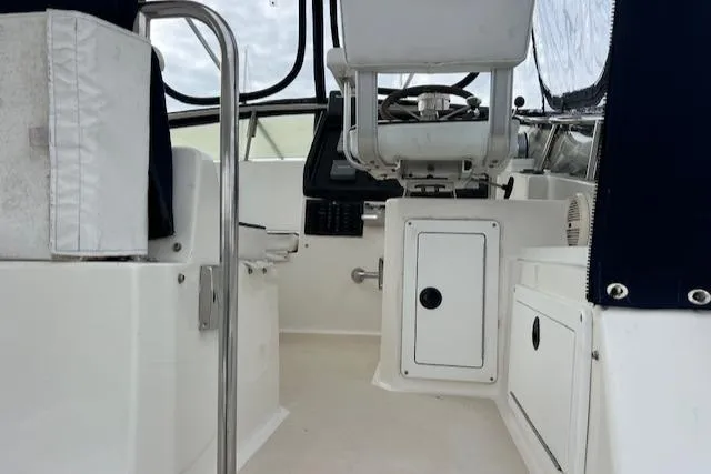 Slide: The Image of Interior view of 2003 Albin 32 + 2 Command Bridge boat cockpit. - 15