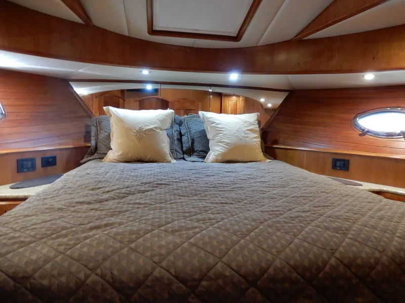 Slide: The Image of Luxurious cabin interior of 2008 Bracewell Pacesetter 540 yacht with cozy bedding. - 10