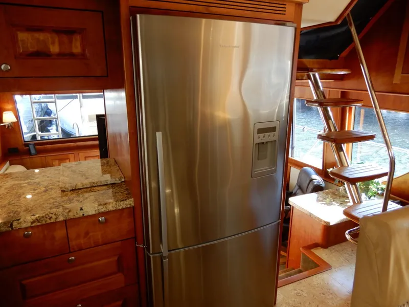 Slide: The Image of Luxurious kitchen interior of 2008 Bracewell Pacesetter 540 yacht with stainless steel refrigerator. - 4