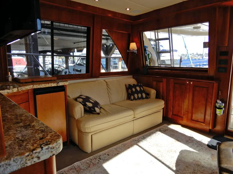 Slide: The Image of Luxurious interior of 2008 Bracewell Pacesetter 540 yacht with leather sofa and wooden cabinetry. - 5