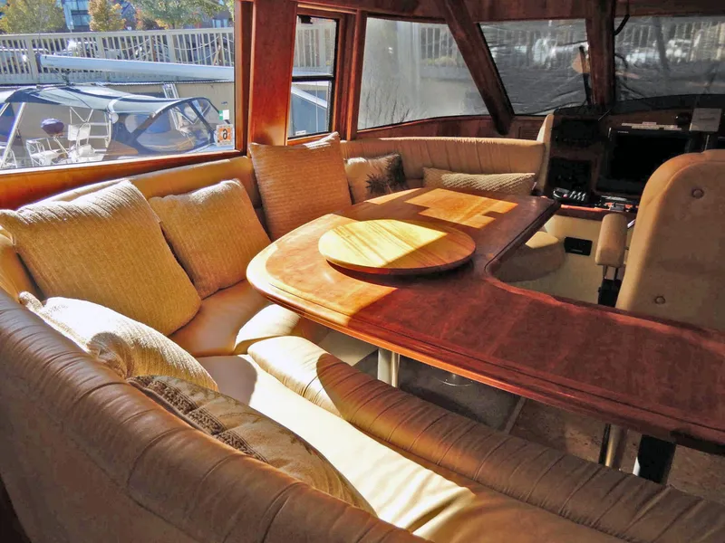 Slide: The Image of Luxurious interior of 2008 Bracewell Pacesetter 540 yacht with plush seating and wooden table. - 7