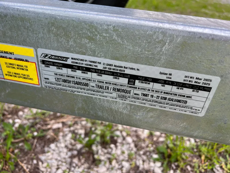 Slide: The Image of Yamaha Boats 255XE 2025 trailer label with specifications and manufacturing details. - 9