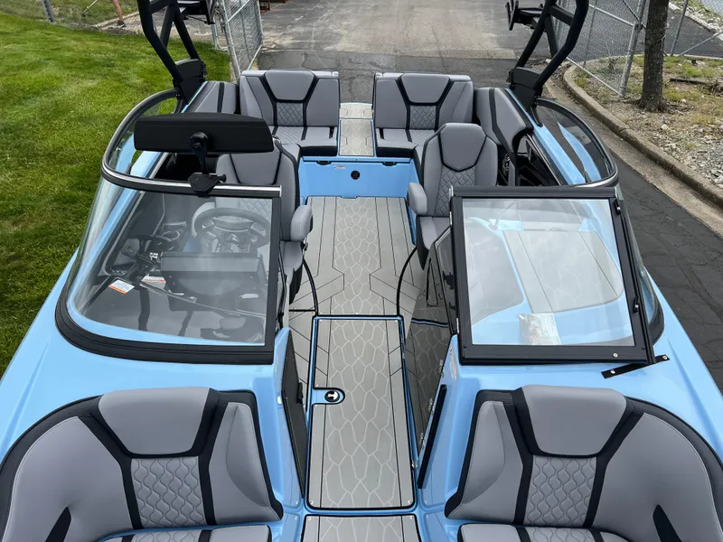 Slide: The Image of 2025 Yamaha Boats 255XD interior with modern seating and sleek design. - 16