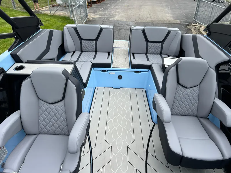 Slide: The Image of 2025 Yamaha Boats 255XD interior with modern seating and sleek design. - 17