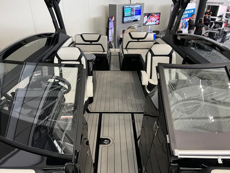 Slide: The Image of 2025 Yamaha Boats 275 SD interior with sleek seating and modern design. - 14