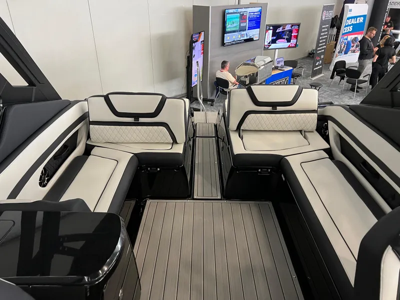 Slide: The Image of 2025 Yamaha Boats 275 SD interior with luxurious seating and modern design. - 15