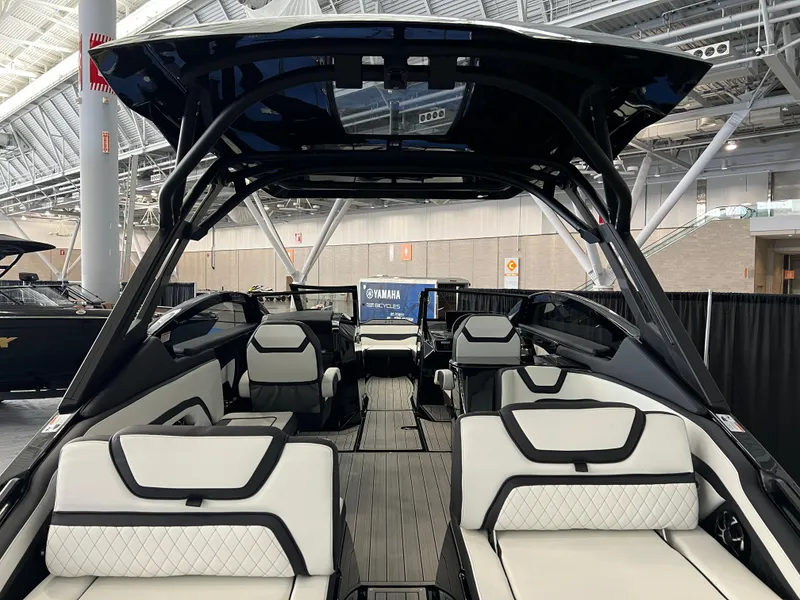 Slide: The Image of 2025 Yamaha Boats 275 SD interior with sleek seating and modern design. - 5