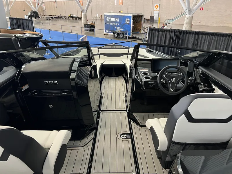 Slide: The Image of 2025 Yamaha Boats 275 SD interior with sleek design and modern dashboard. - 8