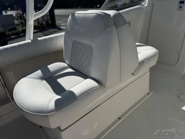 Slide: The Image of 2025 Key West 239 DFS boat interior with white seating and console. - 14