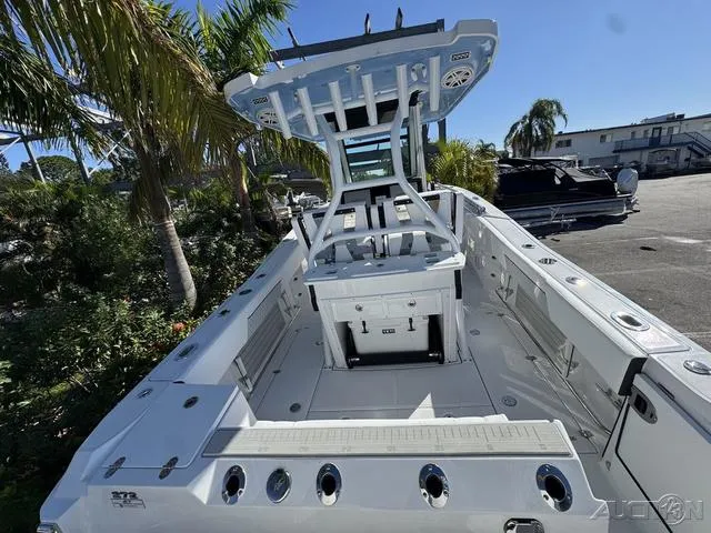 Slide: The Image of 2025 Blackfin 272CC boat with sleek design, spacious deck, and modern features. - 12