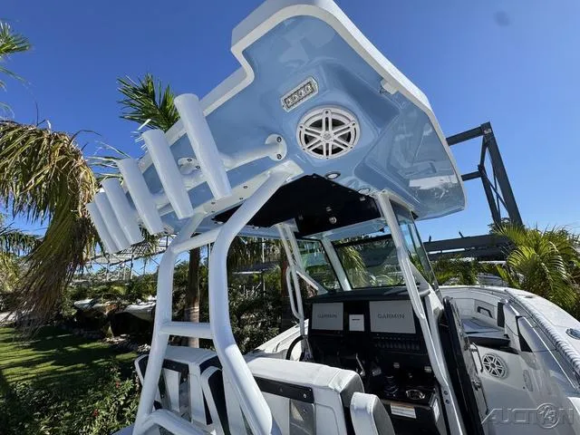 Slide: The Image of 2025 Blackfin 272CC boat interior with advanced navigation system and sleek design. - 18