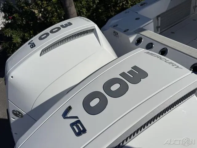 Slide: The Image of 2025 Blackfin 272CC boat with twin Mercury V8 engines. - 8