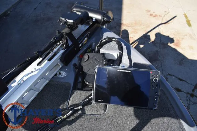 Slide: The Image of 2025 Bass Cat Cougar FTD boat with advanced navigation system and trolling motor. - 13