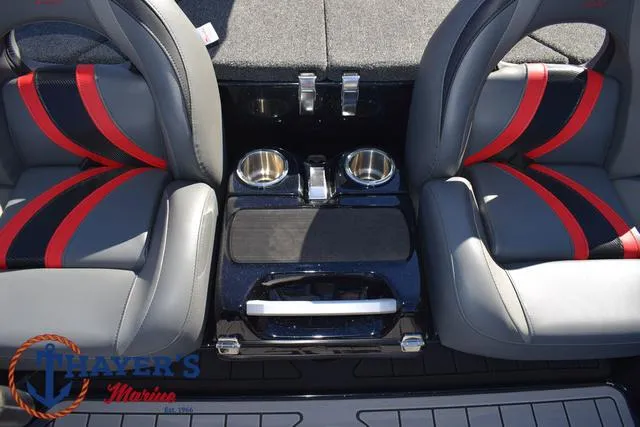 Slide: The Image of 2025 Bass Cat Cougar FTD boat interior with dual seats and cup holders. - 26