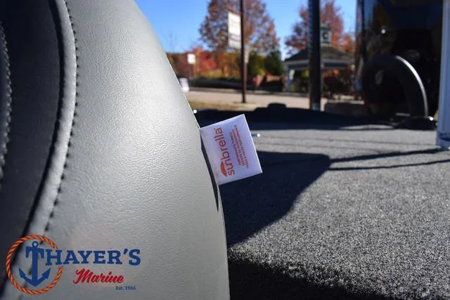 Slide: The Image of 2025 Bass Cat Cougar FTD boat interior with Sunbrella fabric, Thayer's Marine logo visible. - 36