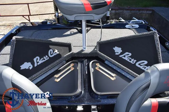 Slide: The Image of 2025 Bass Cat Cougar FTD boat interior with storage compartments and seating. - 38