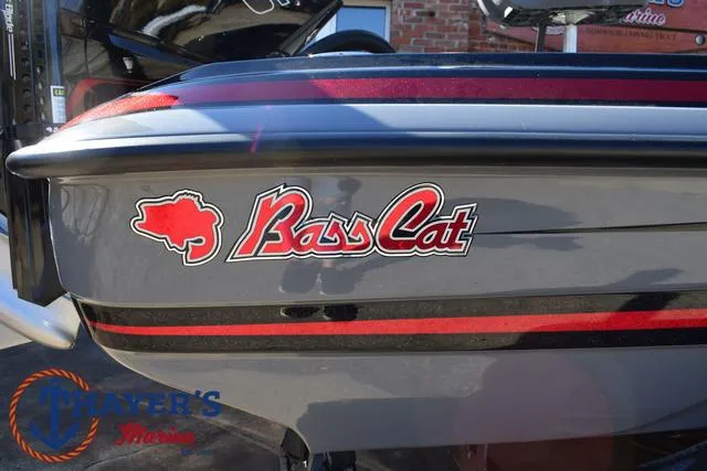 Slide: The Image of 2025 Bass Cat Cougar FTD boat with logo and Mayer's Marine branding. - 4