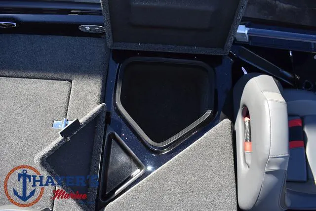 Slide: The Image of 2025 Bass Cat Cougar FTD boat interior storage compartments and seating. - 40