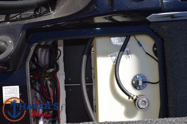 Slide: The Image of 2025 Bass Cat Cougar FTD boat interior showing wiring and fuel tank components. - 43