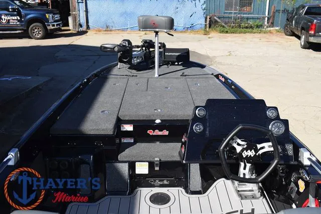 Slide: The Image of 2025 Bass Cat Cougar FTD boat interior with steering wheel and control panel. - 46