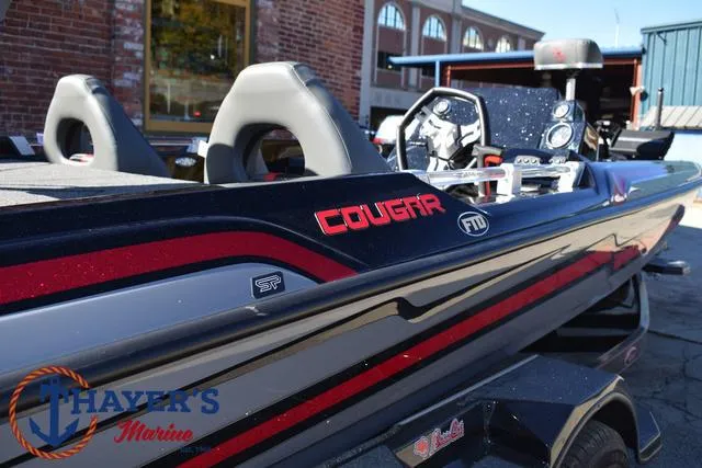 Slide: The Image of 2025 Bass Cat Cougar FTD boat with sleek design and modern features. - 48