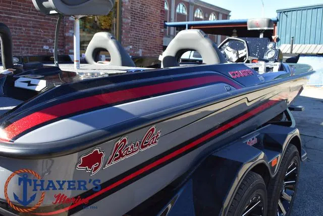Slide: The Image of 2025 Bass Cat Cougar FTD boat with sleek design and vibrant colors. - 49
