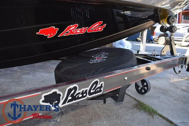 Slide: The Image of 2025 Bass Cat Cougar FTD boat trailer with logo, displayed at Thayer's Marine. - 8