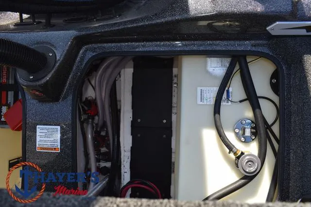 Slide: The Image of 2025 Bass Cat Cougar FTD boat interior showing wiring and components. - 20