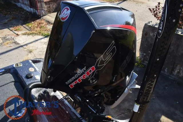 Slide: The Image of 2025 Bass Cat Cougar FTD with Mercury Pro XS engine, outdoor setting. - 21