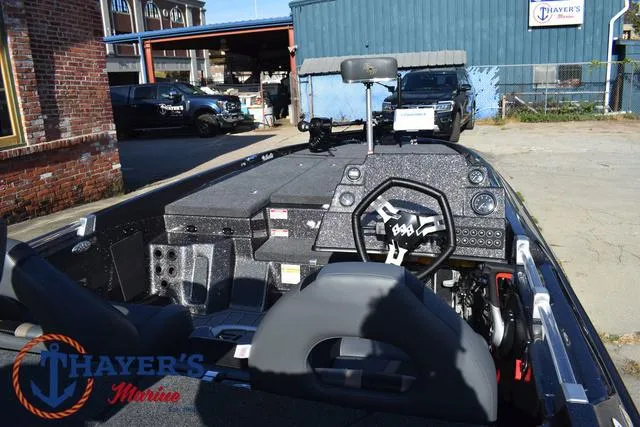 Slide: The Image of 2025 Bass Cat Cougar FTD boat interior at Thayer's Marine dealership. - 24