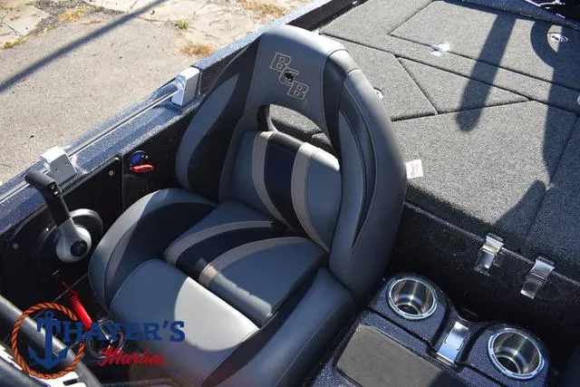 Slide: The Image of 2025 Bass Cat Cougar FTD boat interior with sleek seating and cup holders. - 27