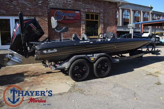 Slide: The Image of 2025 Bass Cat Cougar FTD boat at Thayer's Marine dealership. - 3