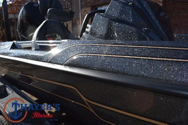 Slide: The Image of 2025 Bass Cat Cougar FTD boat with glittery finish at Thayer's Marine. - 31