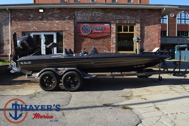 Slide: The Image of 2025 Bass Cat Cougar FTD boat at Thayer's Marine dealership. - 34