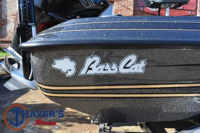 Slide: The Image of 2025 Bass Cat Cougar FTD boat with logo, displayed at Thayer's Marine. - 36