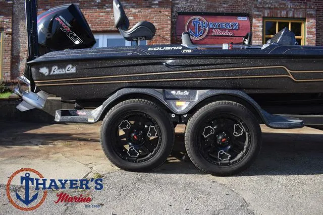 Slide: The Image of 2025 Bass Cat Cougar FTD boat on trailer at Thayer's Marine. - 38