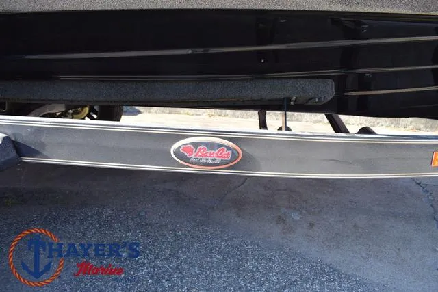Slide: The Image of 2025 Bass Cat Cougar FTD boat trailer with logo, displayed at Thayer's Marine. - 39