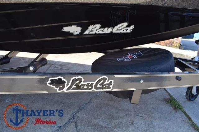 Slide: The Image of 2025 Bass Cat Cougar FTD boat trailer with Thayer's Marine logo. - 40