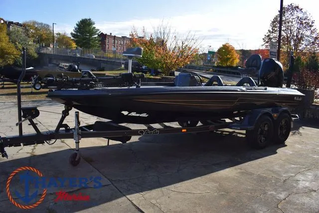 Slide: The Image of 2025 Bass Cat Cougar FTD boat on trailer in outdoor setting. - 41