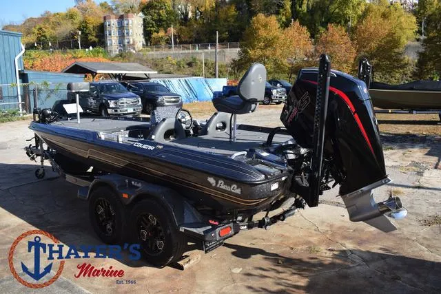 Slide: The Image of 2025 Bass Cat Cougar FTD boat on trailer at Thayer's Marine dealership. - 42