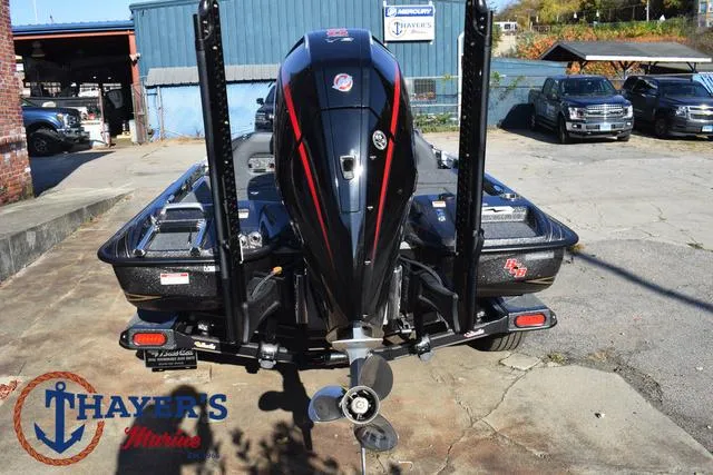 Slide: The Image of 2025 Bass Cat Cougar FTD boat at Thayer's Marine dealership. - 43
