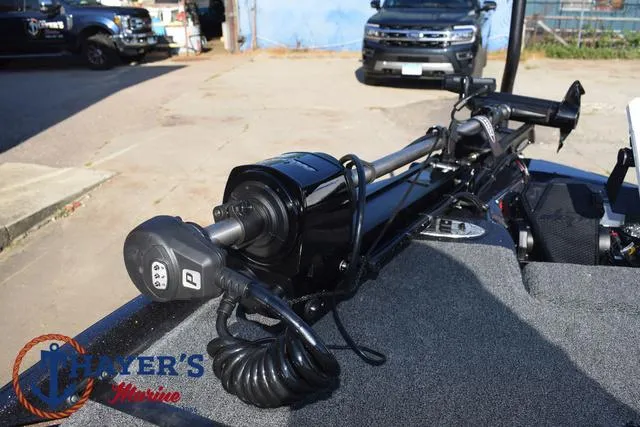 Slide: The Image of 2025 Bass Cat Cougar FTD boat with trolling motor on deck. - 44