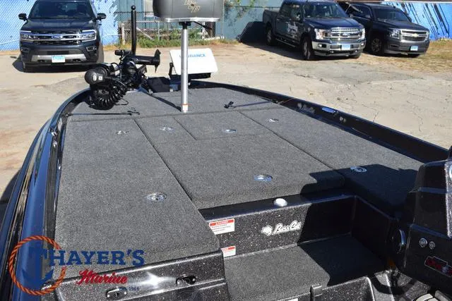 Slide: The Image of 2025 Bass Cat Cougar FTD boat with spacious deck and storage compartments. - 48